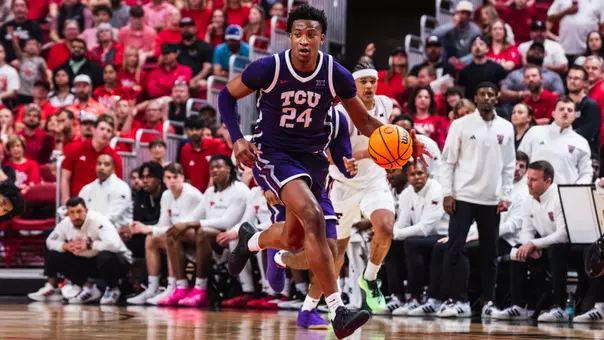 Xavier Edmonds drives down the court at Texas Tech.