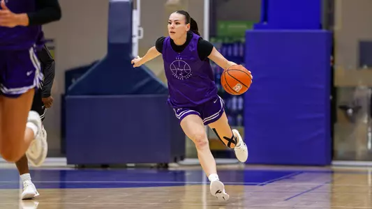 Jessie-May Hall pushes the ball up court in transition during a scrimmage.