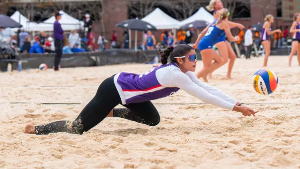 Marcela Mattoso diving for a ball