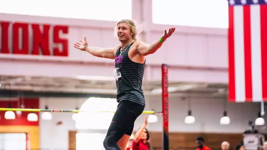 Yannik Knoblock celebrates after clearing the bar in high jump