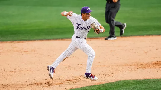 Jack Bell makes a running throw from shortstop against Arizona at Lupton Stadium.