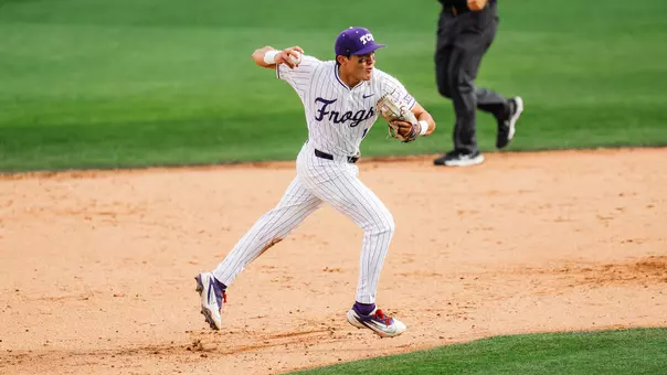 Jack Bell makes a running throw from shortstop against Arizona at Lupton Stadium.