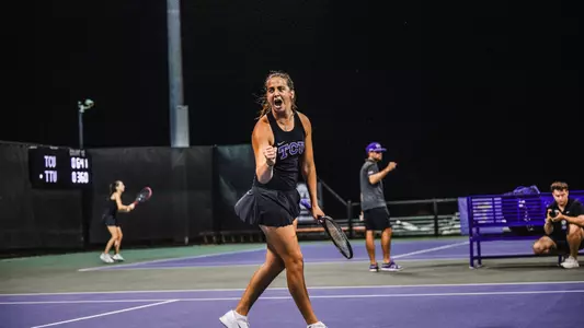 Jennifer Jackson celebrating after clinching the match against Texas Tech