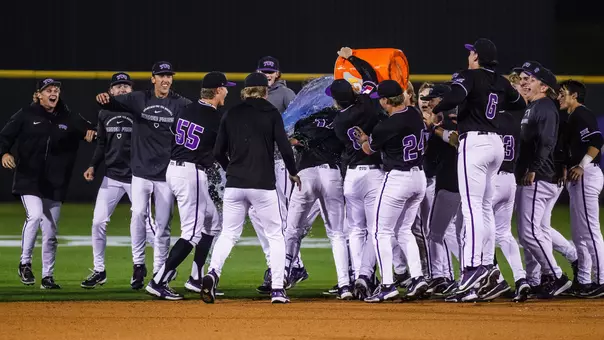 The TCU baseball team celebrates by pouring Gatorade over Rob Liddington after his game-winning hit.