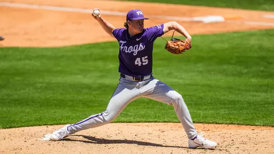 Lance Davis throws a pitch from the mound at Baylor Ballpark.