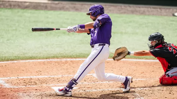 Cole Cramer swings at a pitch in a game against Houston.