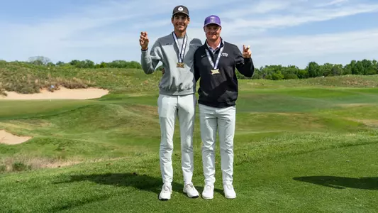 Sam Udovich and Lewis Wright show off Big 12 All-Tournament.