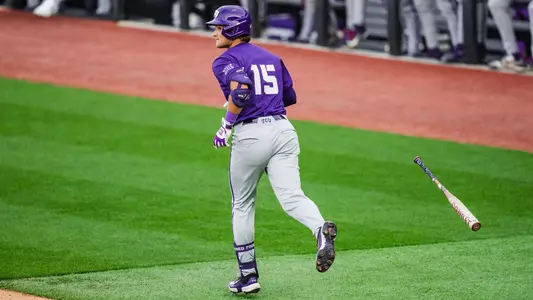 Chase Brunson runs down the first base line after hitting a home run.