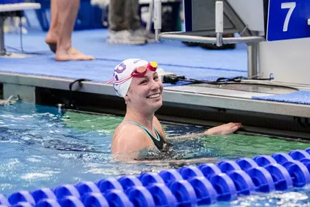 Josephine Brant smiling and looking at the camera after finishing a race