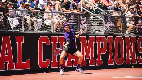 Cosme Rolland De Ravel hits a forehand in TCU's NCAA semifinal match vs. No. 1 Texas