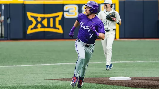Cole Cramer runs around second base.