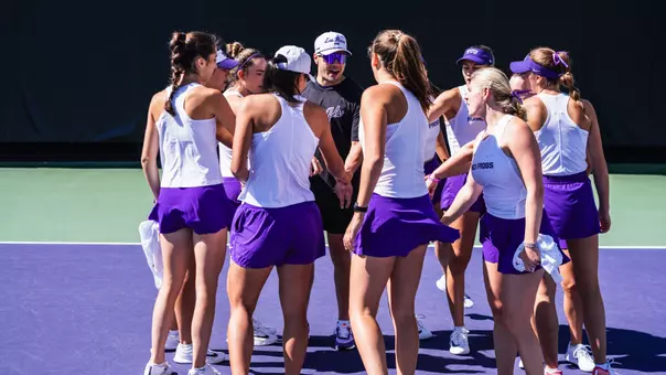 TCU Women's Tennis huddle prior to match against Rice