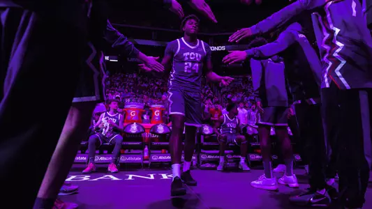 xavier edmonds walks through during starting lineups