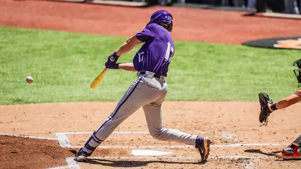 Rob Liddington hits a home run against Oklahoma State.