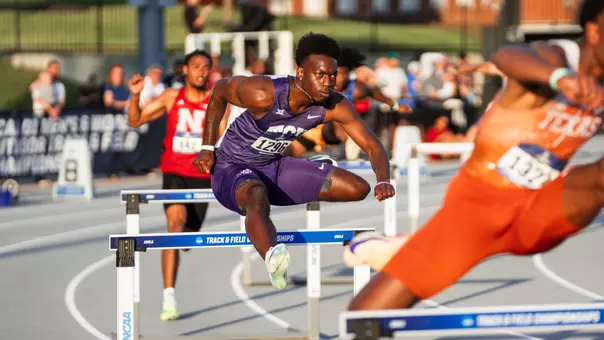 TCU's Jayden Douglas jumps over a hurdle at the NCAA West First Round