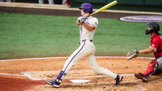 Rob Liddington swings at a pitch in a game against Houston.