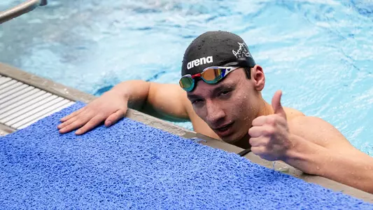 Yochanan Meza throwing up a thumbs up sign