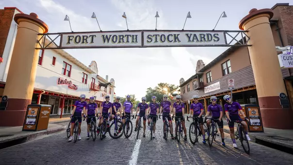 TCU Triathlon in front of the Fort Worth Stock Yards sign