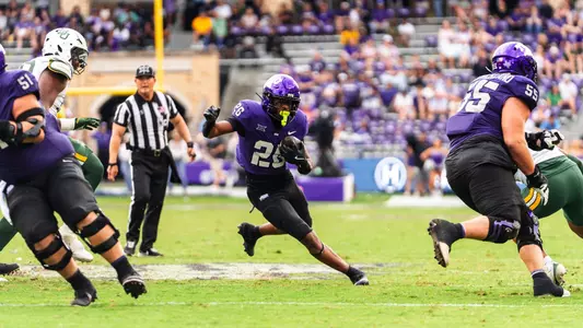Jeremy Payne running with the ball at home against Baylor
