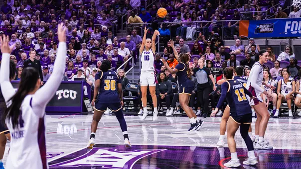 Clara Bielefeld releases the basketball on a 3-point attempt.