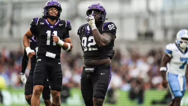 Ansel Din-Mbuh celebrating after a tackle