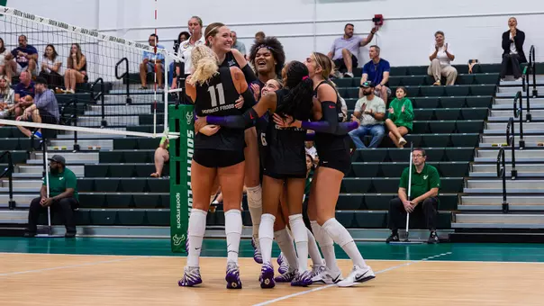 TCU Volleyball hugs middle blocker Morgan Holloman