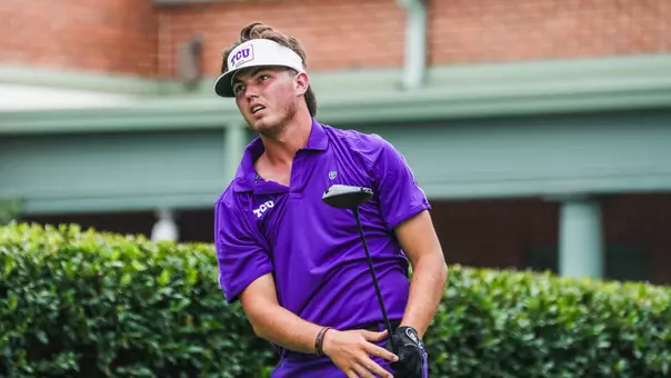 Cameron Kuchar watches the ball from the tee box