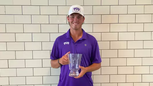 Cameron Kuchar with the trophy after winning the Bearcat Invitational