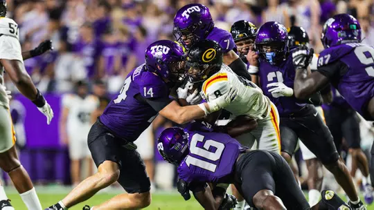 TCU Defense swarming to a tackle against Grambling State