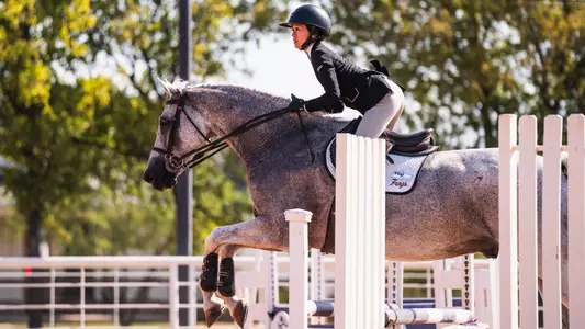 Lily Muzzy jumping fences