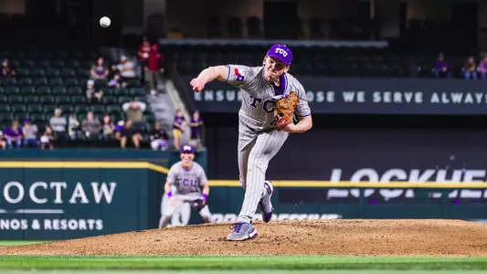 Lance Davis throws a pitch at Globe Life Field