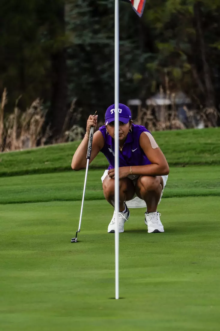 Kirstin Angosta stars at the pin ahead of a birdie putt attempt.