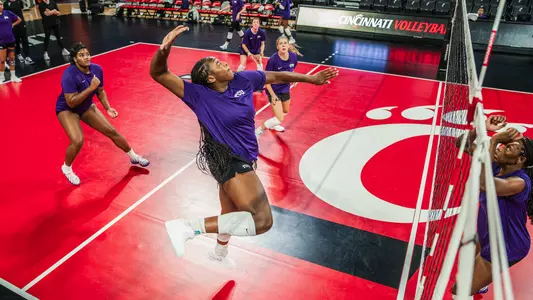 Dee McMillian hits a slide at TCU volleyball's practice in Cincinnati