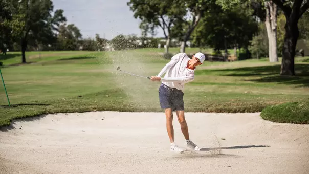 Nathan Miller hits out of the bunker.
