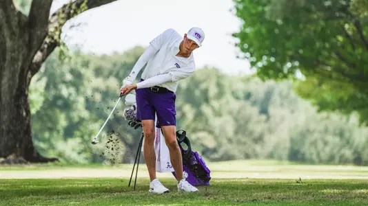 nathan miller strikes the ball during a practice