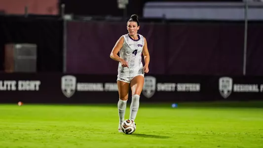 Zoe Cuneio dribbling the ball against Texas A&M