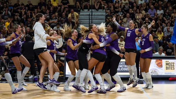 TCU volleyball celebrates after sweeping Purdue on the road