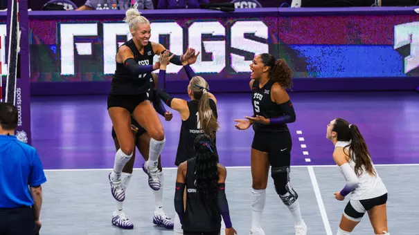 TCU Volleyball's Becca Kelley and Rosemary Archer celebrate a point against SMU