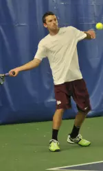 Senior Andrew Warren won in three sets Saturday.