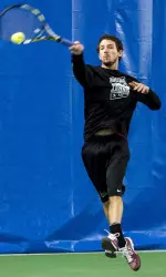 Warren lost in three sets at No. 1 singles.