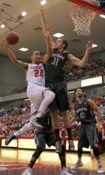 Jack Lopez defends EWU's Drew Brandon (Photo by Torrey Vail)
