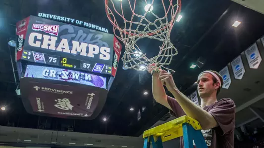 Bobby Moorehead cutting down net