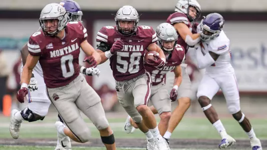 Patrick O'Connell #58 of the Montana Grizzlies run with an interception in the third quarter of a college football game against Northwestern State at Washington-Grizzly Stadium on September 3, 2022 in Missoula, Montana. The Grizzlies beat the Demons 47-0. during a college football game against Northwestern State at Washington-Grizzly Stadium on September 3, 2022 in Missoula, Montana. The Grizzlies beat the Demons 47-0.