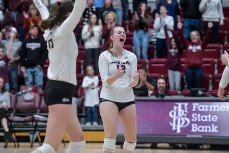 Sarah Ashley #12 of the Montana Grizzlies celebrates during a college volleyball game between the Montana Grizzlies and the Idaho State Bengals on Oct. 22, 2022 in Dahlberg Arena. The Griz beat the Bengals 3-0.