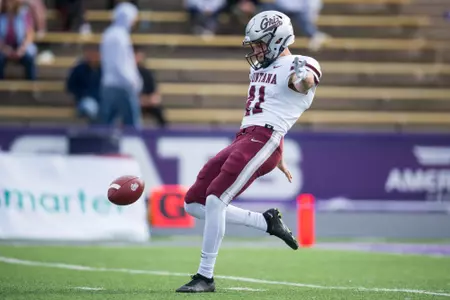 Patrick Rohrbach #41 of the Montana Grizzlies punts during a college football game against the Weber State Wildcats at Stewart Stadium in Ogden Utah on Oct. 22, 2022.
