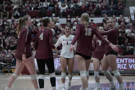 Sarina Moreno #1 celebrates a point with her teammates during a college volleyball game between the University of Montana Grizzlies and the Montana Bobcats on Nov.11, 2022 in Dahlberg Arena.