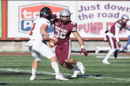 Levi Janacaro #36 of the Montana Grizzlies attempts to sack Gunner Talkington #2 of the Eastern Washington Eagles during a college football game against the Eastern Washington Eagles at Washington-Grizzly Stadium on November 5, 2022 in Missoula, Montana.