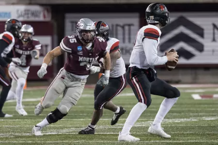 Braxton Hill (35) of the Montana Grizzlies rushes the quarterback during a college football playoff game between the Montana Grizzlies and the Southeast Missouri State Redhawks at Washington-Grizzly Stadium in Missoula, Montana on November 27th, 2022.