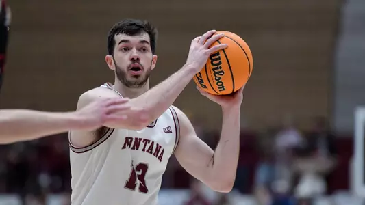 Montana Grizzlies forward Josh Bannan (13) passes the ball during a college basketball game between the Montana Grizzlies and the Eastern Washington University Eagles at Dahlberg Arena on Dec. 29, 2022 in Missoula, Montana.