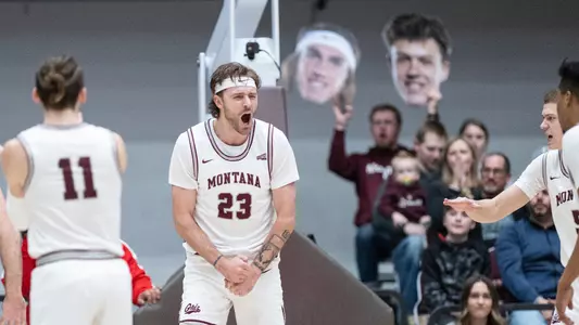 Mack Anderson #23 of the Montana Grizzlies celebrates after getting fouled during the first half against against Idaho State at Dahlberg Arena on January 14, 2023 in Missoula, Montana.